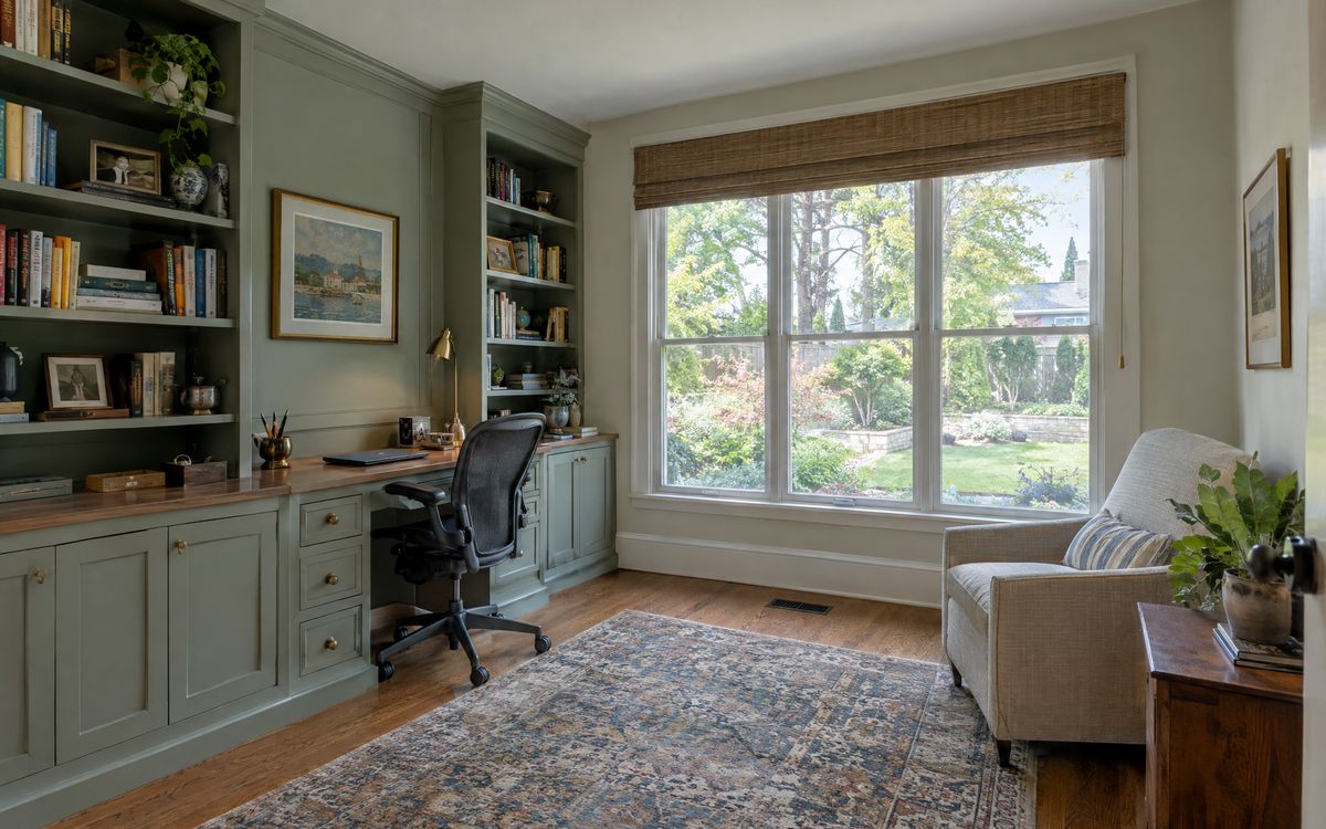A built-in painted desk and bookcases in a Staten Island house home office, design concept